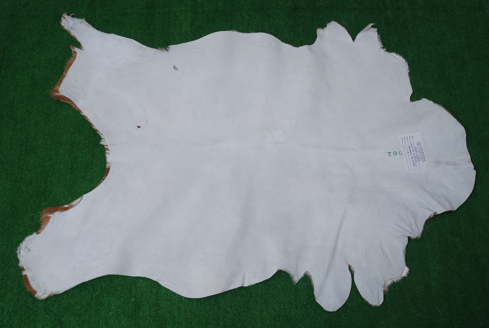 Luxury Brown and White Goat Hide Rug - Handpicked Premium Natural Goat Skin Rug with Unique Patterns and Non-Slip Suede Back - Celestial Leather Limited