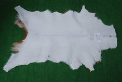 Decorative Brown and White Goat Hide Rug - Perfect for Floor or Wall Accents