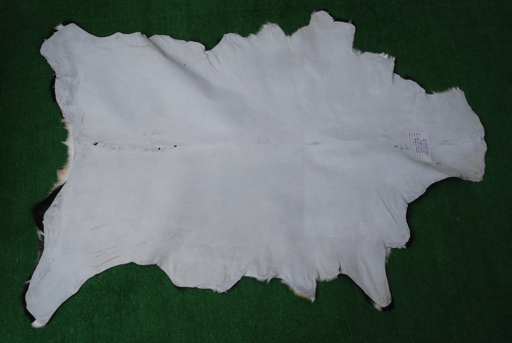 Sophisticated Black & White Goat Skin Rug - Modern Decor Accent for Home - Natural, Soft, and Unique Animal Skin Throw Rug - Celestial Leather Limited