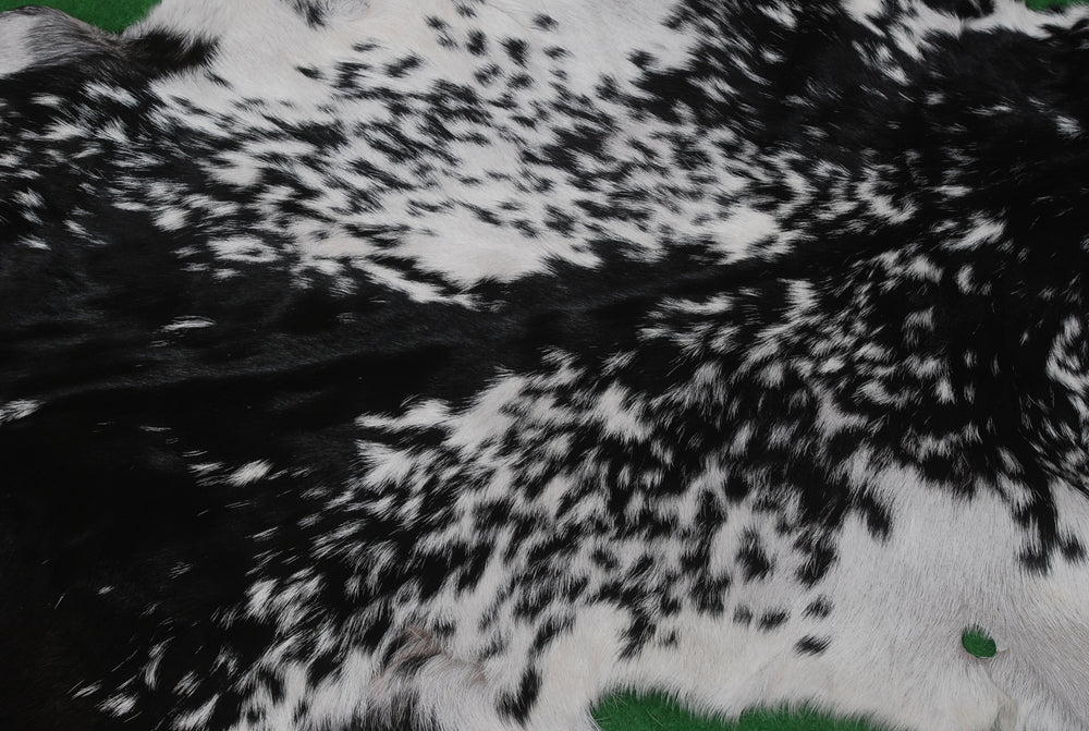 Luxurious Handmade Black & White Goat Skin Rug - Soft, Pet-Friendly, Hypoallergenic, & Eco-Friendly - Unique Statement Piece for Your Home - Celestial Leather Limited