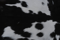 Natural Black and White Goat Hide Rug - Luxurious and Stylish Floor Accent