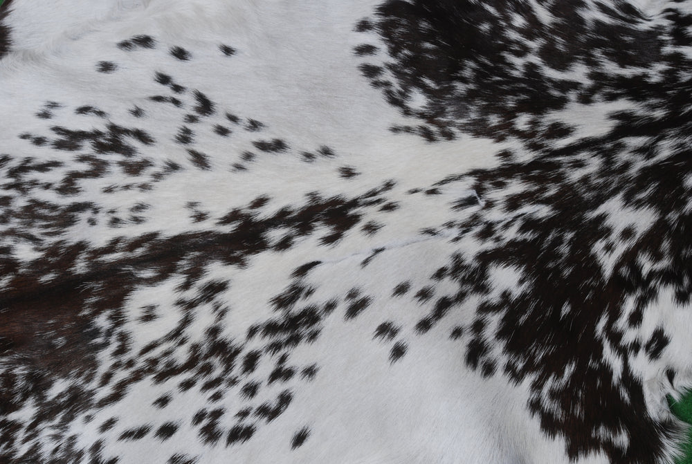 Luxurious Black & White Goat Skin Rug for Home Décor - Celestial Leather Limited