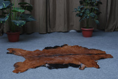 Natural Dark Brown Goat Hide Rug - Perfect for Modern and Rustic Spaces