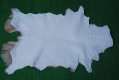 Luxurious Brown and White Goat Hide Rug - Natural Hair-On Leather for Home Styling