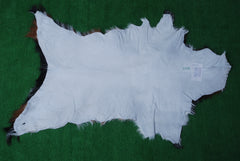 Rustic Black and White Goat Hide Rug - Perfect for Floor or Wall Décor