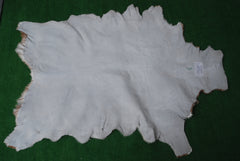 Rustic Brown and White Goat Skin Rug - Unique Pattern for Modern and Classic Décor