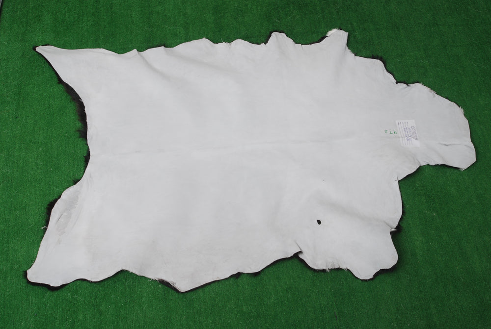 Luxurious Handmade Black & White Goat Skin Rug: Soft, Hypoallergenic, Sustainable, Non-Shedding & Unique - Add Nature's Beauty to Your Home - Celestial Leather Limited