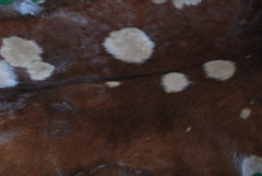 Natural Dark Brown Goat Hide Rug - Perfect for Modern and Rustic Spaces