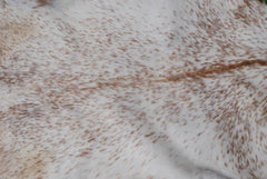 Rustic Brown and White Goat Skin Rug - Unique Pattern for Modern and Classic Décor