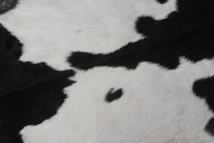 Luxurious Handmade Black & White Goat Skin Rug: Soft, Hypoallergenic, Sustainable, Non-Shedding & Unique - Add Nature's Beauty to Your Home - Celestial Leather Limited