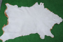 Natural Brown and White Goat Hide Rug - Luxurious Accent for Modern Homes