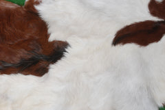 Natural Hair-On Dark Brown Goat Skin Rug - Elegant and Durable for Any Room