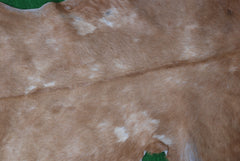 Luxurious Brown and White Goat Hide Rug - Natural Hair-On Leather for Home Styling