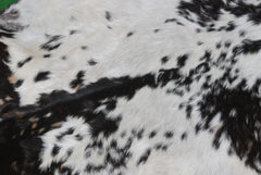 Decorative Black and White Goat Skin Rug - Genuine Leather for Sophisticated Spaces