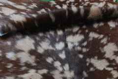 Handcrafted Tri-Color Goat Skin Rug - Soft and Durable for Elegant Interiors