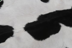 Serene Grey & White Goat Skin Rug - Natural Animal Hide Floor Decor with Suede Back - Sustainable, Eco-Friendly, and Hypoallergenic