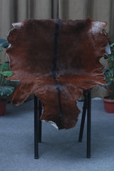 Luxurious Dark Brown Goat Skin Rug - Genuine Hair-On Leather for Elegant Décor