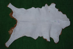 Luxurious Brown and White Goat Hide Rug - Natural Hair-On Leather for Home Styling