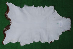 Goat Skin Rug: Brown and white genuine Goat hide rug - Celestial Leather Limited