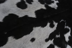 Natural Black and White Goat Hide Rug - Luxurious and Stylish Floor Accent