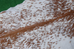 Luxurious Brown and White Goat Hide Rug - Natural Hair-On Leather for Home Styling