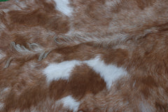 Luxurious Brown and White Natural Goat Skin Rug with Non-Slip Suede Back - Handcrafted Premium Hair-On Goat Hide Rug for Home Decor - Celestial Leather Limited