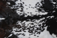 Natural Black and White Goat Hide Rug - Luxurious and Stylish Floor Accent