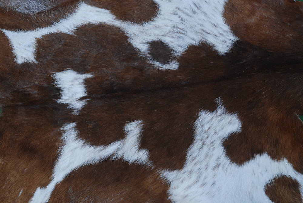 Luxurious Handmade Dark Brown & White Goat Skin Rug - Soft, Durable, Non-Shedding, Eco-Friendly - Unique Statement Piece for Home Décor - Celestial Leather Limited
