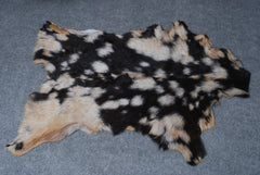Handcrafted Tri-Color Goat Skin Rug - Soft and Durable for Elegant Interiors