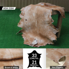 Elegant Brown and White Goat Hide Rug - Perfect Accent for Living Room or Bedroom