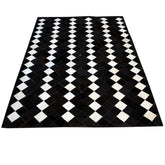 Luxurious Handmade Cowhide Patchwork Rug with Zig Zag Stitching - Unique Leather Area Rug for Home Décor - Customizable Designs Available