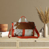Stylish Cowhide Leather Laptop Bag with Unique Orange Straps and Premium Craftsmanship for Business and Travel