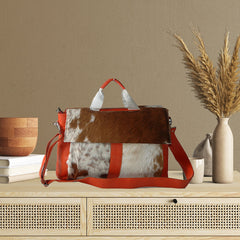 Stylish Cowhide Leather Laptop Bag with Unique Orange Straps and Premium Craftsmanship for Business and Travel