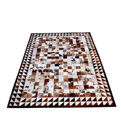 Luxurious Handmade Cowhide Patchwork Rug with Zig Zag Stitching - Unique & Functional Home Decor Accent
