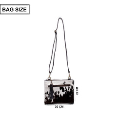 Unique Vegan Leather Handbag with Adjustable Strap and Gold Hardware - Stylish Evening Bag with Natural Cowhide Markings - Celestial Leather Limited