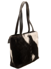 Luxurious Black and White Cowhide Shoulder Bag - Handmade Natural Hair-On Leather Purse with Ample Storage Space and Stylish Design