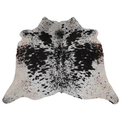 Luxury Handcrafted Brown and White Cowhide Rug - Hypoallergenic, Non-Slip Backing, Unique Natural Beauty, Durable and Versatile