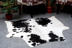 Luxury Handcrafted Cowhide Rug in Bold Black and White - Stunning Home Décor Accent with Hypoallergenic Properties