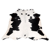 Luxurious Black and White Cowhide Rug - Hypoallergenic, Non-Slip, Handcrafted, Unique Beauty - Adds Sophistication to Any Room