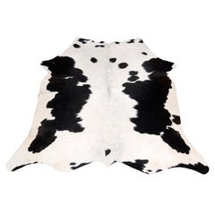 Luxurious Black and White Cowhide Rug - Hypoallergenic, Non-Slip, Handcrafted, Unique Beauty - Adds Sophistication to Any Room
