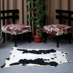 Luxurious Black and White Cowhide Rug - Hypoallergenic, Non-Slip, Handcrafted, Unique Beauty - Adds Sophistication to Any Room