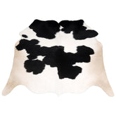 Luxurious Handcrafted Black and White Cowhide Rug - Hypoallergenic, Non-Slip Backing, Unique Markings - Durable and Versatile Home Decor