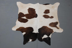 Luxury Handcrafted Brown & White Cowhide Rug - Hypoallergenic, Non-Slip Backing, Unique Natural Beauty - Durable - Versatile Home Decor