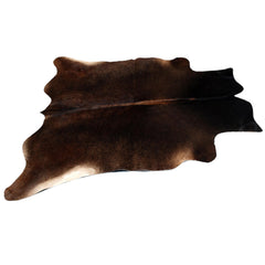 Luxurious Medium Brown and White Cowhide Rug for Rustic Home Decor - Handcrafted Natural Hide with Unique Markings