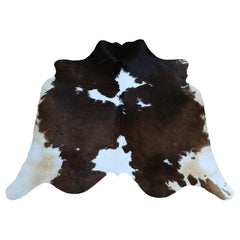 Luxury Medium Cowhide Rug: Dark Brown & White Hide, Hypoallergenic, Handcrafted, Durable - Versatile for Bedroom/ Living Room - 100% Natural
