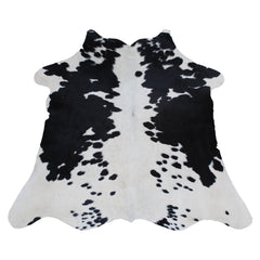 Luxurious Natural Dark Brown and White Small Animal Print Cowhide Rug with Hypoallergenic and Non-Slip Backing - Free Shipping UK