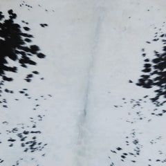 Luxury Black and White Cowhide Rug with Unique Natural Beauty and Hypoallergenic Properties
