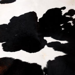 Luxurious Black & White Cowhide Rug | Hypoallergenic - Non-Slip | Handcrafted from Natural Hides | Durable - Versatile Home Décor