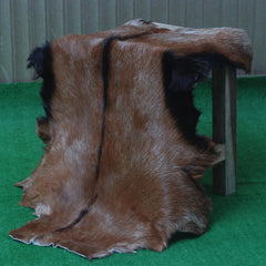 Luxurious Brown and Black Goat Hide Rug with Unique Patterns and Non-Slip Suede Back - Sustainable Eco-Friendly Accent Piece - Celestial Leather Limited