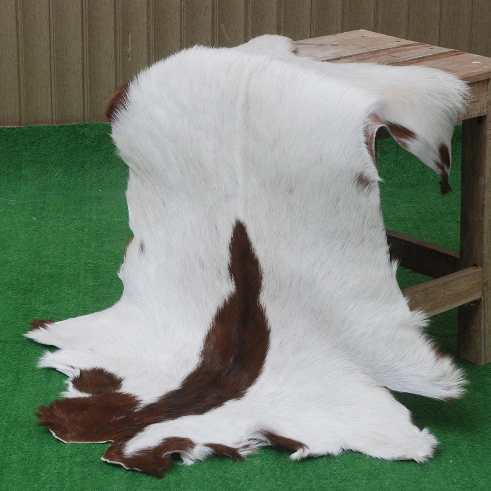 Luxury Brown & White Goat Hide Rug - Premium Hair-on Skin - Eco-Friendly - Hypoallergenic - Handcrafted Elegance for Any Room - Celestial Leather Limited